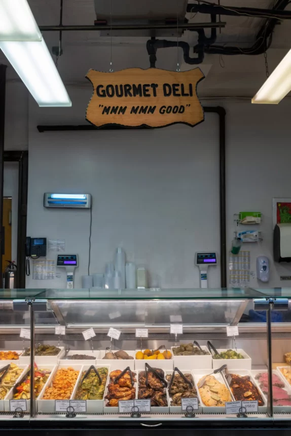 There is a deli in a grocery store.