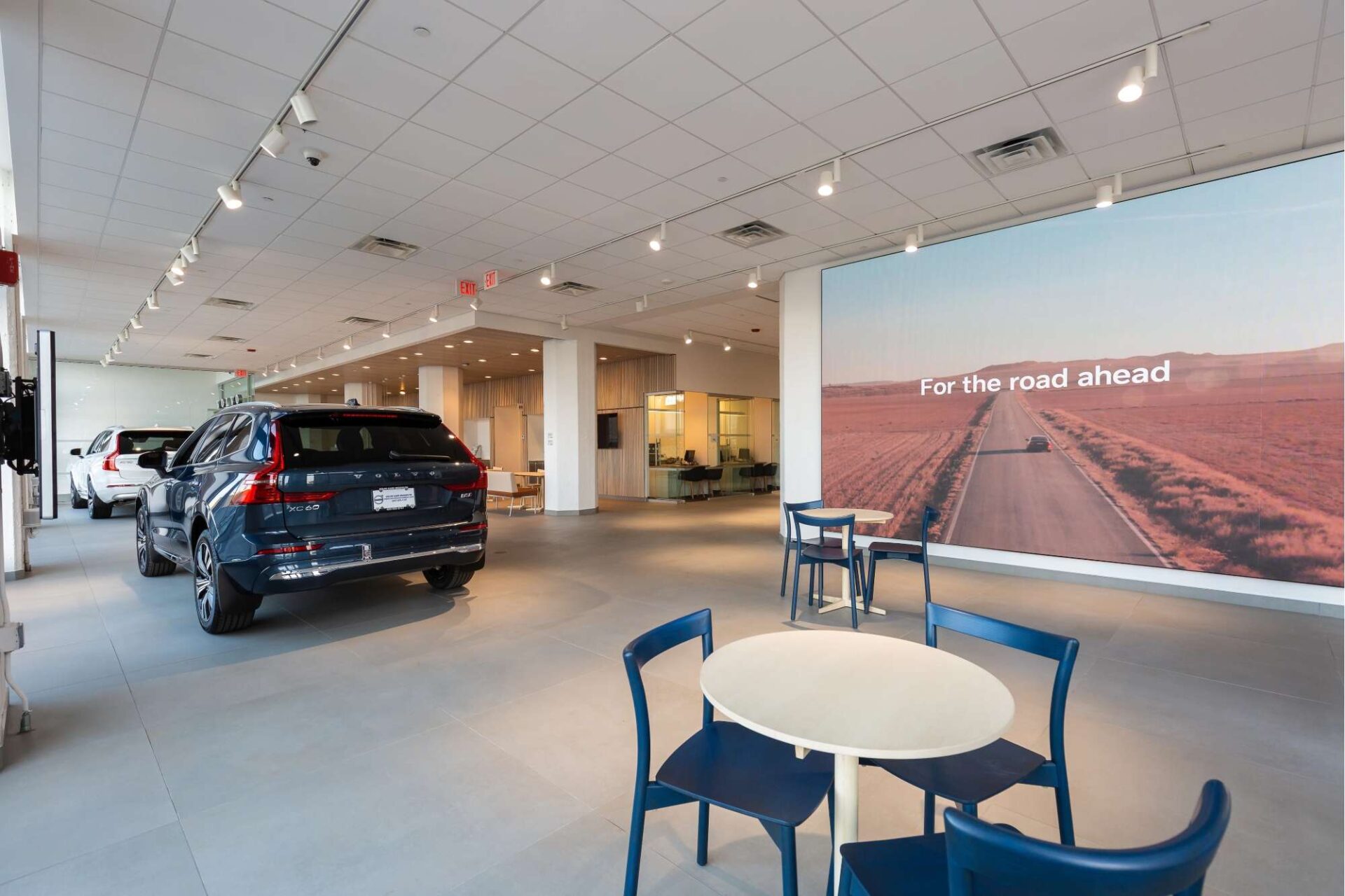 The interior of a Volvo dealership.