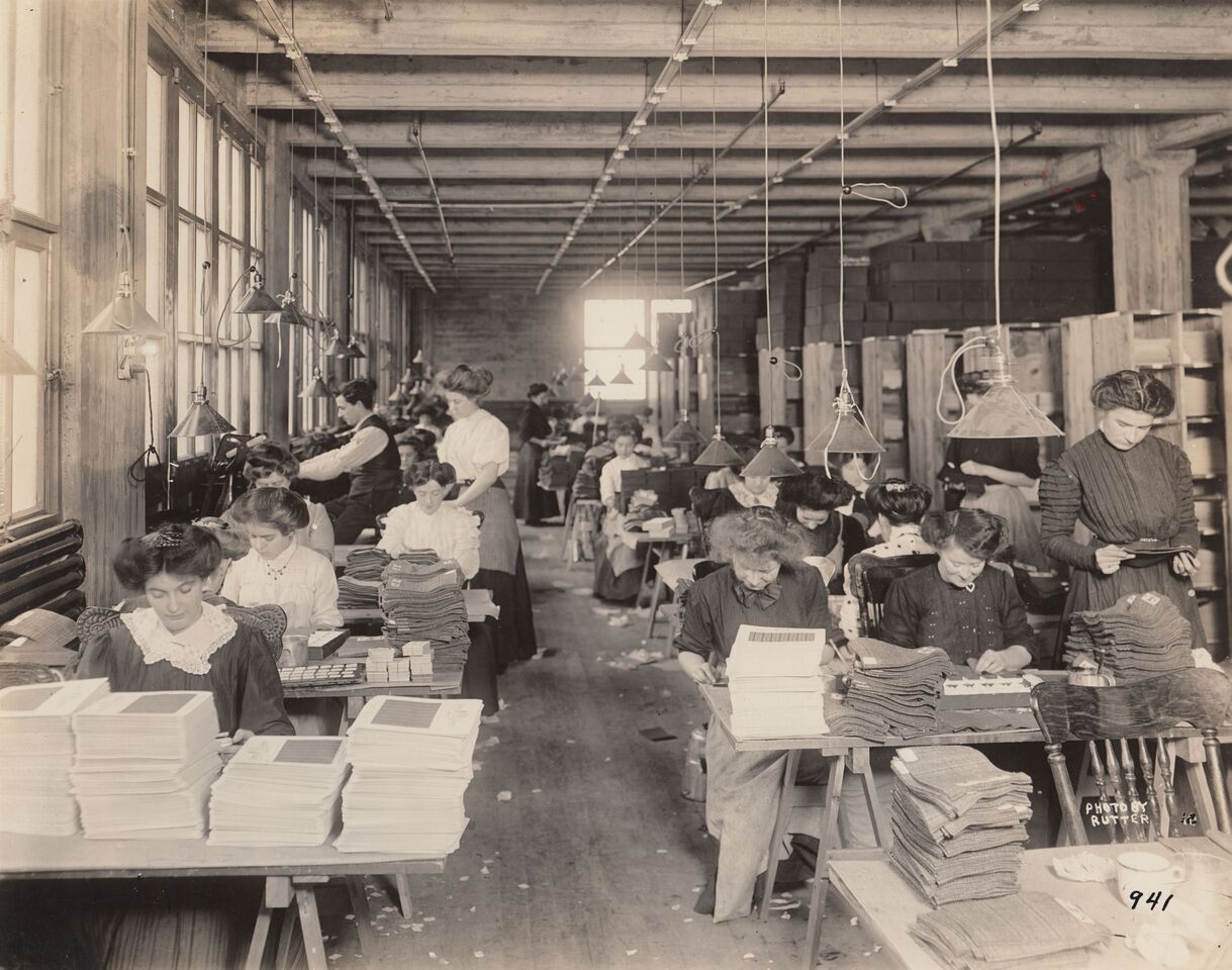 A historic image of people working.